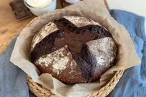 Chocolate sourdough bread with melted chocolate filling and a rustic crust.